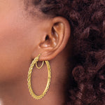 Load image into Gallery viewer, 10K Yellow Gold Round Diamond Cut Rope Hoop Earrings 50mm x 2.95mm
