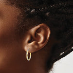 Load image into Gallery viewer, 10K Yellow Gold With Rhodium Round Diamond Cut Twisted Hoop Earrings 21mm x 2.5mm
