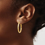 Load image into Gallery viewer, 10K Yellow Gold Round Diamond Cut Knife Edge Hoop Earrings 25mm x 2.5mm
