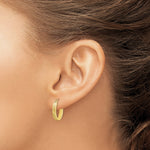將圖片載入圖庫檢視器 10K Yellow Gold Brushed Diamond Cut Oval Hoop Earrings 19mm x 13mm x 1.4mm
