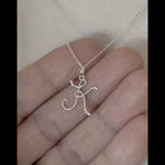 Load and play video in Gallery viewer, 14k Gold or Sterling Silver .03 CTW Diamond Script Letter K Initial Necklace
