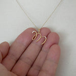 Load and play video in Gallery viewer, 14k Gold or Sterling Silver .03 CTW Diamond Script Letter M Initial Necklace
